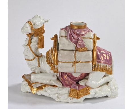 Majolica pottery model of a reclining camel, the saddle bags with a vase section and lifts off to reveal a compartment, the c