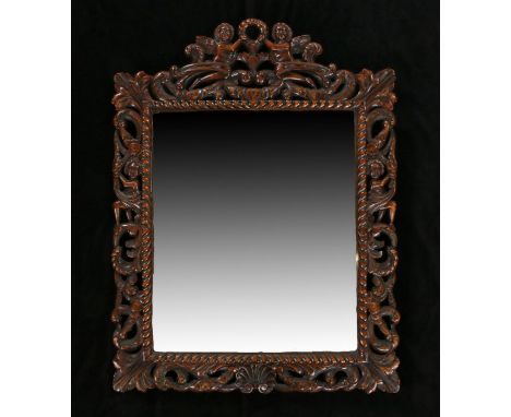 17th Century style Flemish oak wall mirror, the rectangular mirror with carved with a angels holding a wreath above the acant