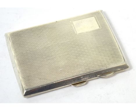 A George V hallmarked silver engine turned cigarette case, Birmingham 1929, approx 2.7ozt, length 9cm.