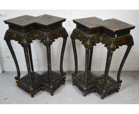 A pair of 20th century Oriental lacquered side tables, stepped graduated top with carved frieze below on five curving legs an