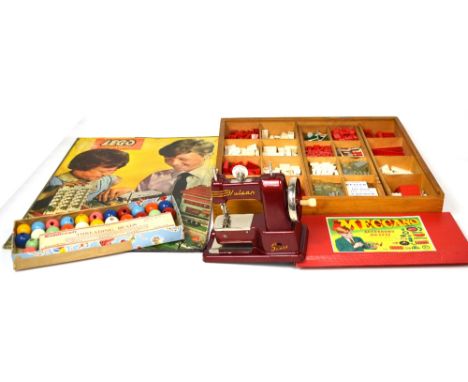 A boxed vintage Lego system, a boxed Vulcan child's sewing machine, a Meccano accessory outfit and Wavecrest Kiddicraft threa