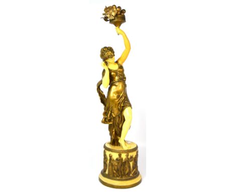 A painted spelter figural lamp modelled as a young girl on rounded base, height 77cm (af). CONDITION REPORT Has been repainte