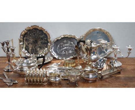 A large quantity of plated ware to include an hors d'oeuvres set with glass dishes, a quantity of trays, candelabra and a tea