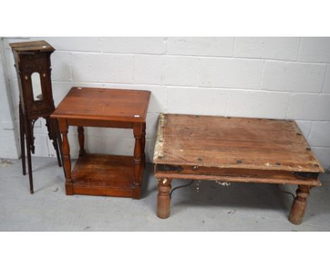An Indian coffee table on turned legs and metal supports, length 90cm, an Indian carved jardinière stand (af) and a modern ma