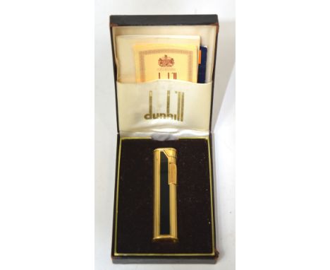 A boxed Dunhill dress lighter with original instructions and guarantee. 