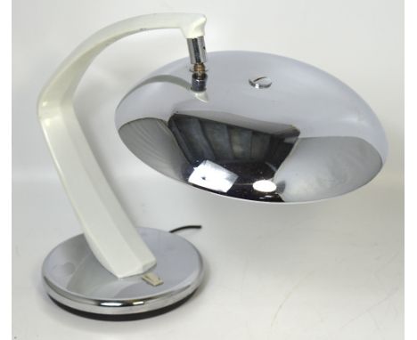 A retro chromed angle poise swivel table lamp, height approx 40cm. CONDITION REPORT Chrome slightly pitted, paint to arm worn