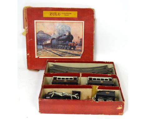 A boxed Hornby Meccano Zulu clockwork train set. CONDITION REPORT In playworn condition with surface scratches, small areas o