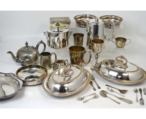 A quantity of silver plated items to include tea services, flatware and a large twin handled tray etc.