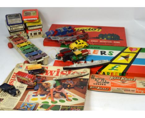 A quantity of diecast and plastic vehicles to include Matchbox and Days Gone, vintage console games and a quantity of board g