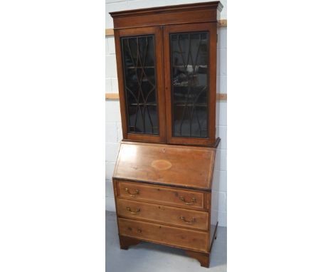 A c1900 walnut and inlaid bookcase bureau with twin astragal glazed doors to bracket feet, width 76cm (af).