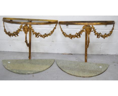 A pair of ornate gilt metal and onyx demi-lune console tables for wall mounting, height of both 52cm.