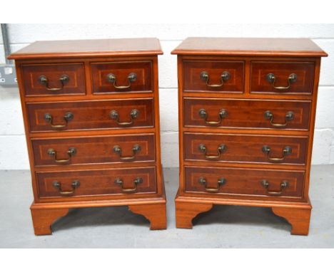A pair of modern five drawer cabinets on bracket feet, width of both 46cm.