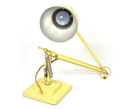 A retro cream anglepoise lamp.