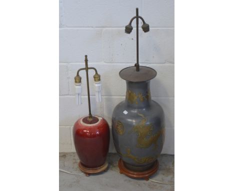 A large modern Chinese lamp of baluster form, height of branches approx 90cm, also a red glazed lamp (2).