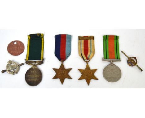 Four medals; a Territorial Army Efficient Service medal, a 1935-1945 Defence Medal, the 1939-1945 Star medal, the Africa Star