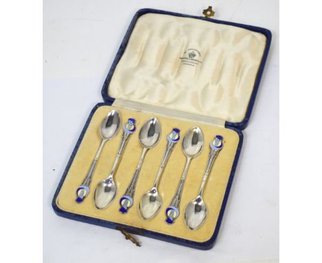 A cased set of George V hallmarked silver teaspoons with enamel Art Deco finial, maker Mappin & Webb, Birmingham 1935, combin