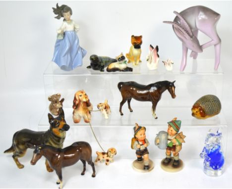 A Goebel model of an Alsatian, Beswick horses and further decorative animal figures to include a koala etc.