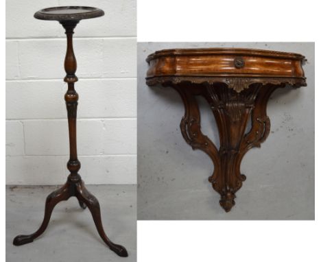 A heavily carved walnut demi-lune console table for wall mounting, width 76cm and a hardwood jardinière stand on tripod suppo