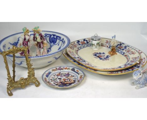 Two large oval ceramic meat plates and a smaller plate, a blue and white washbowl and a small ceramic rabbit etc.