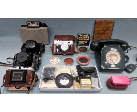Mixed lot of cameras and accessories, vintage telephone etc
all used unchecked