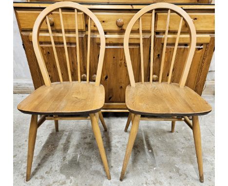 Two Ercol mid 20th century stick back chairs. Approx. 87cms H
reasonable used with scuffs scratches etc