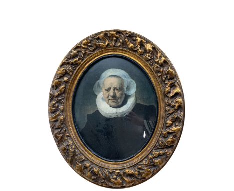 After Rembrandt van Rijn (Dutch 1606-1669): 'Portrait of Aechje Claesdr', colour print housed in oval gilt frame 45cm x 36cm