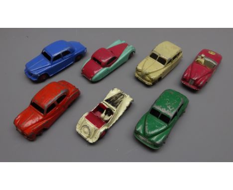 Dinky - seven unboxed and playworn cars including Jaguar XK120 No.157, MG Midget No.108, Sunbeam Alpine No.107, Austin Somers