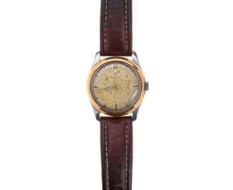 OMEGA STAINLESS STEEL MANUAL WIND WRIST WATCH, on a brown leather strap, lacking box and papers
