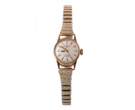 ROTARY GOLD CASED MANUAL WIND WRIST WATCH the round dial with baton hour markers, 17mm case, on a gold plated expanding brace