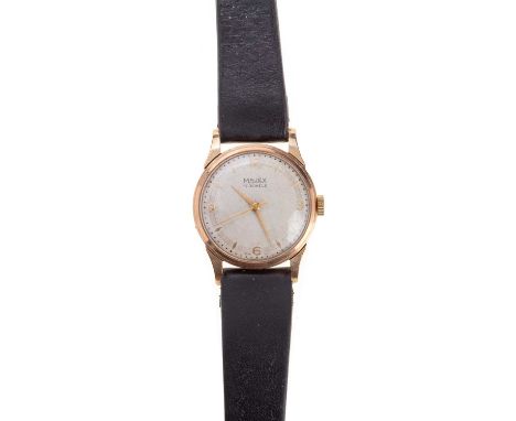 MAJEX NINE CARAT GOLD MANUAL WIND WRIST WATCH,  the round dial with Arabic and diamond shaped hour markers, 29mm case, on a b