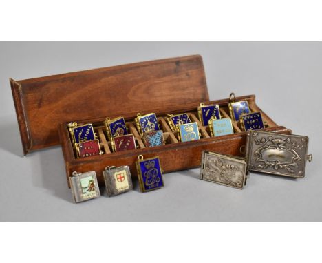 A Collection of Fifteen Various Early 20th Century Royal Commemorative and Souvenir Miniature Enamel Pendant Photograph Books