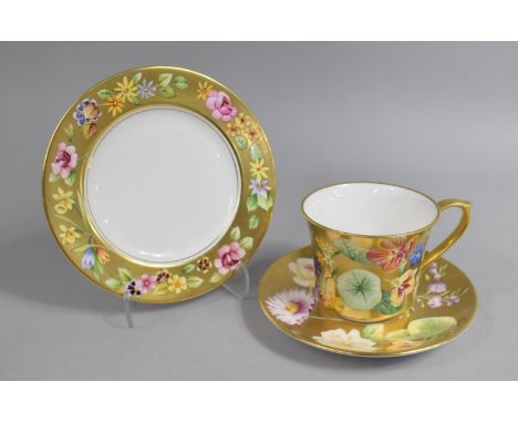 A Caverswall Hand Painted Trio, with Floral Decoration on Gilt Ground by K Hancock 
