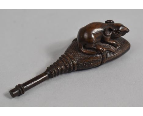 A Japanese Netsuke in the form of a Mouse on a Broom, Signed, 7cm Long 
