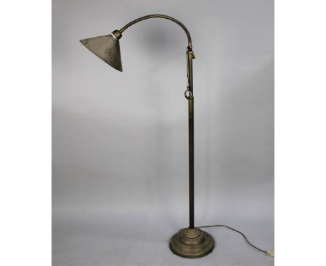 A Vintage Brass Adjustable Reading Lamp with Rise and Fall Mechanism 