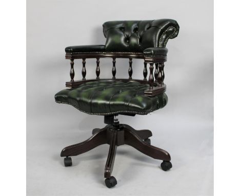 A 20th Century Victorian Style Green Leather Button Back Swivel Office Chair having Spindle Back with Tub Shaped Arms and Bac