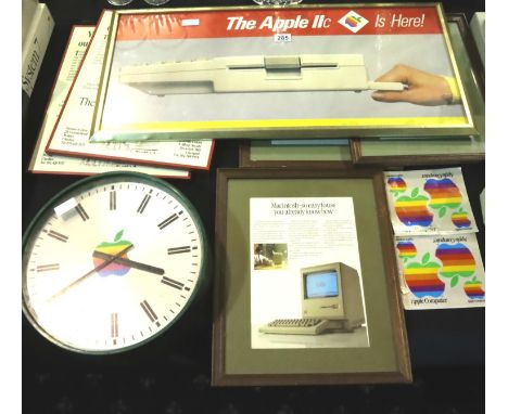 Mixed early Apple Macintosh promotional posters and an Apple branded wall clock. P&amp;P Group 3 (£25+VAT for the first lot a