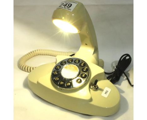 Telephone Lamp, retro ivory push button telephone repurposed as a decorative lamp with a switch on the side, with mains power