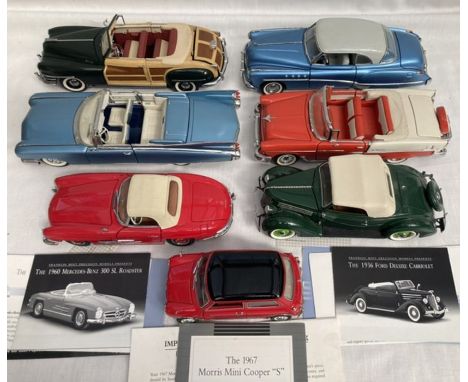 Franklin Mint: A collection of assorted Franklin Mint model cars to include: Morris Mini missing mirror, Mercedes 300SL (miss