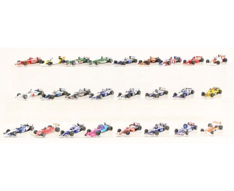 Minichamps: A collection of over twenty unboxed 1:43 Paul's Model Art Minichamps motorsport vehicles. Generally in good condi
