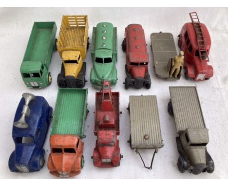 Dinky: A collection of unboxed, playworn Dinky Toys commercial vehicles to include: Petrol Tankers, Fire Engine, Breakdown Lo