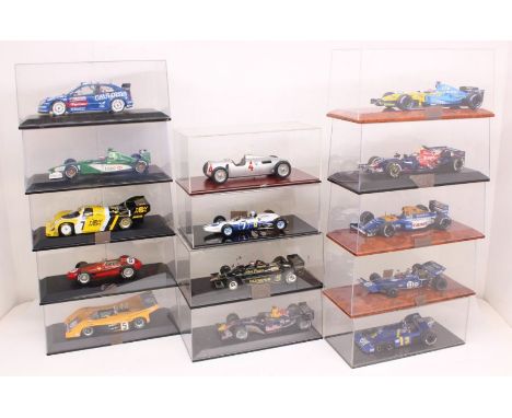 Diecast: A collection of fourteen unboxed 1:18 diecast scale models to include: Hot Wheels, Minichamps, Exoto, CMC, TrueScale