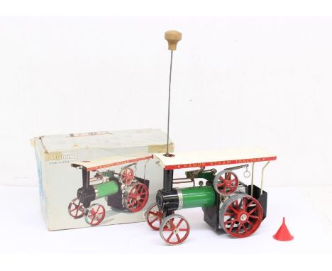 Mamod: A boxed Mamod, Steam Tractor, Reference TE1a, with scuttle and burner, steering rod and small red funnel. Original box