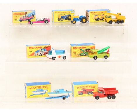 Matchbox: A collection of seven assorted boxed Matchbox vehicles to comprise: Slingshot Dragster 64, Ford Tractor 39, Dodge C