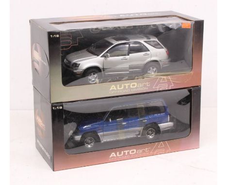 Autoart: A pair of boxed Autoart 1:18 Scale Off-Road Division vehicles, to comprise: Lexus RX 300 Silver, Ref. 70031; and Mit