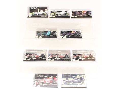 Minichamps: A collection of ten cased Paul's Model Art Minichamps 1:43 Formula 1 and other race vehicles of varying design. S