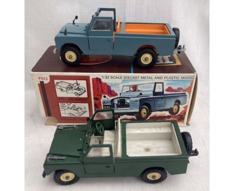 Britains: A boxed Britains Land Rover, Reference Number 9676, together with a similar example unboxed. One in excellent origi