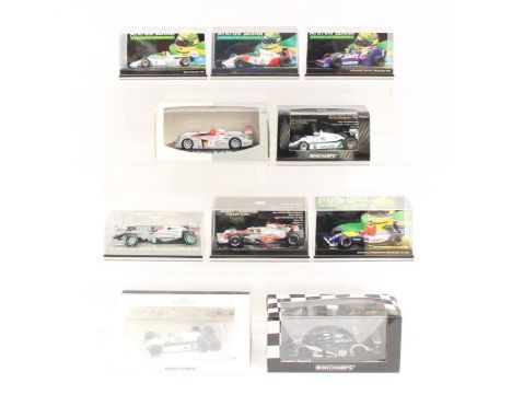 Minichamps: A collection of ten cased Paul's Model Art Minichamps 1:43 race vehicles of varying design. Some limited edition 