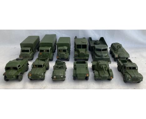 Dinky: A collection of assorted Dinky military vehicles to include: Medium Artillery Tractor, 10 Ton Truck, 3 Ton Truck, Carg