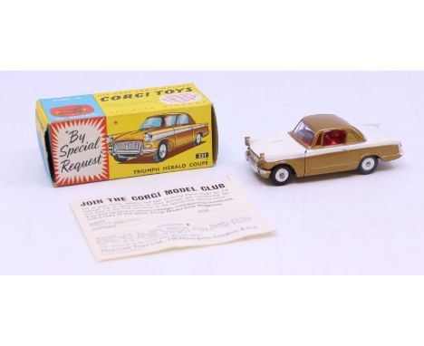 Corgi: A boxed Corgi Toys, Triumph Herald Coupe, white and gold two-tone body with red interior, Reference 231. Original box,