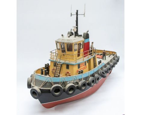 Boat: A scale model boat, mid-20th century, remote-control model. Named Wyeforce. In red, black and blue three-tone colour. G